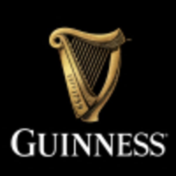 Guinness logo featuring a golden harp above the white "Guinness" text on a black background.